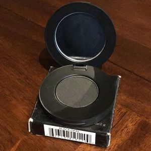 Pressed eyeshadow in black Opal by Youngblood